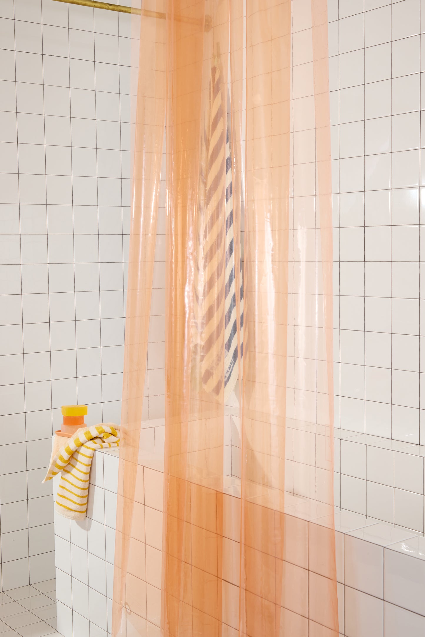 Sun Shower Cloud folded in pleats on curtain rod