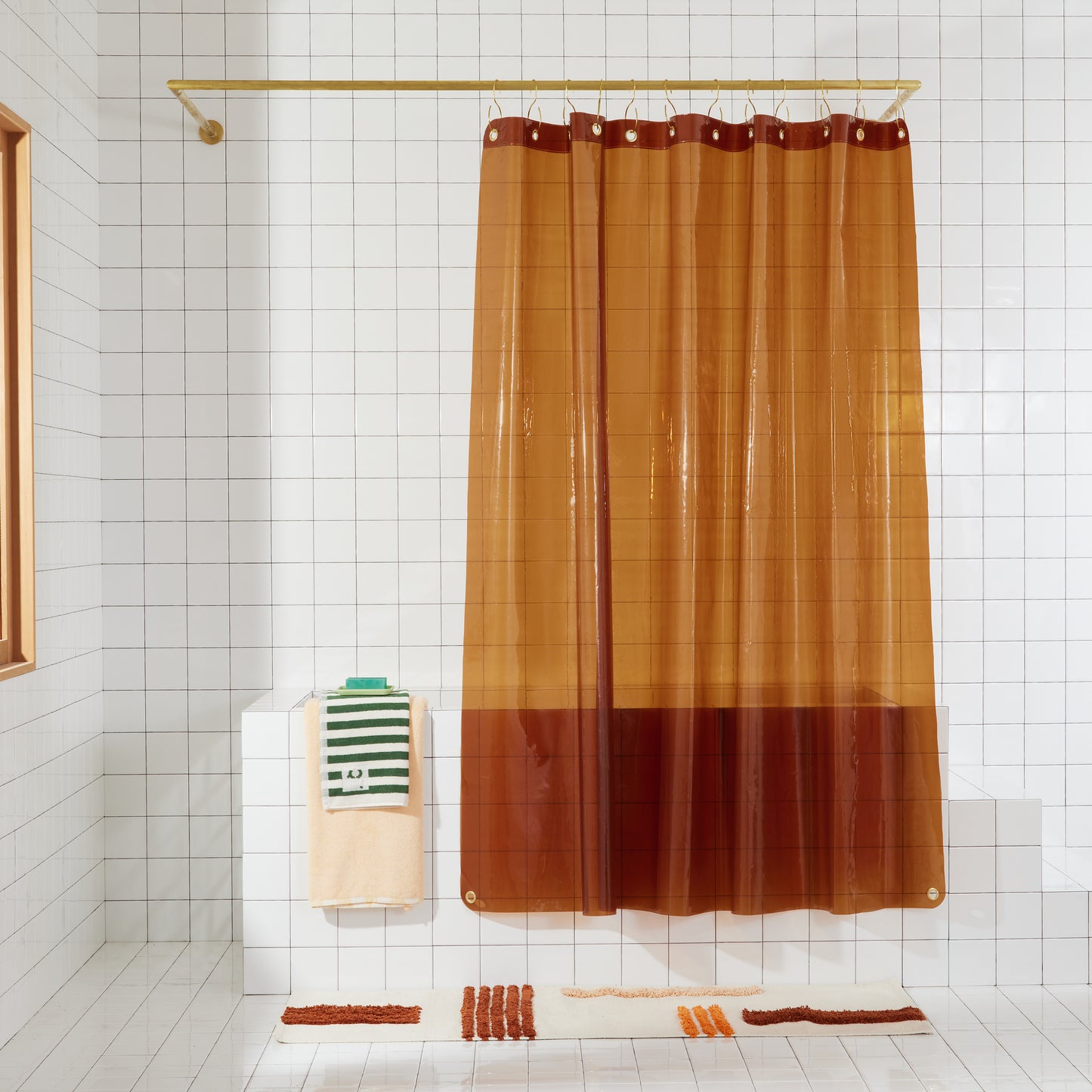 Sun Shower Honey front view of curtain hanging in a bathroom.