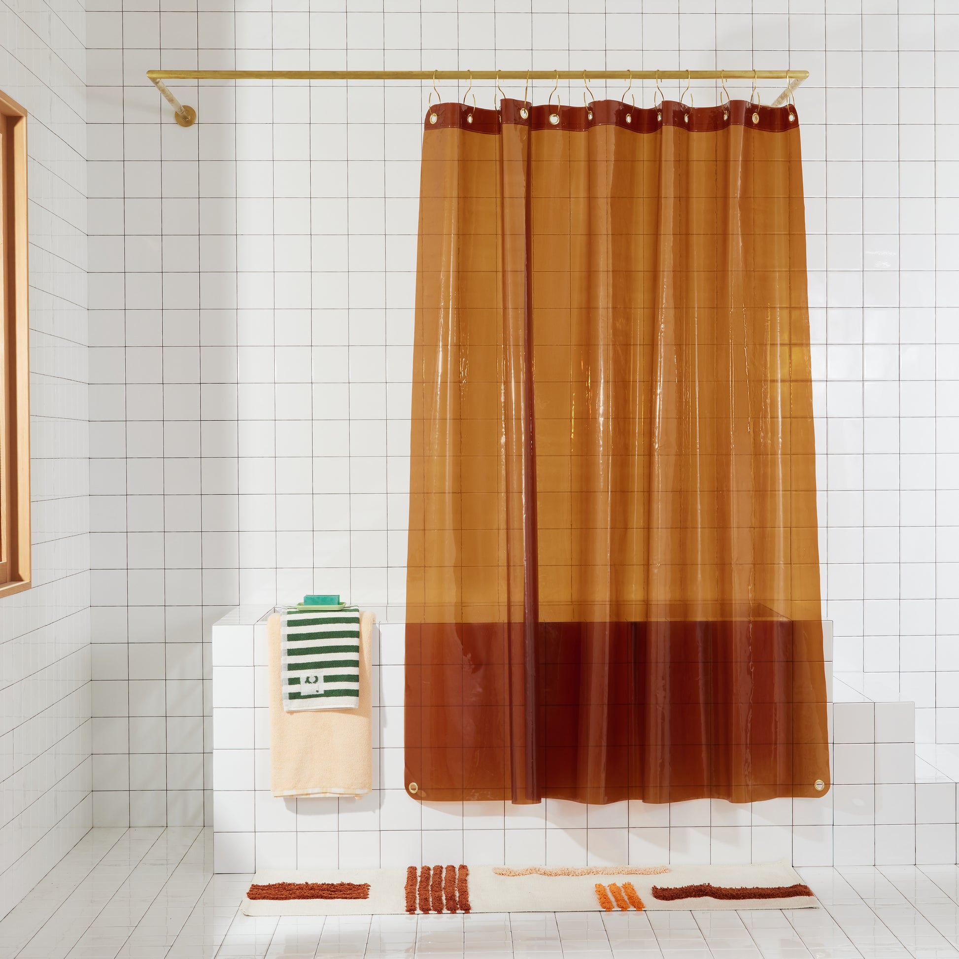 Sun Shower Honey front view of curtain hanging in a bathroom.