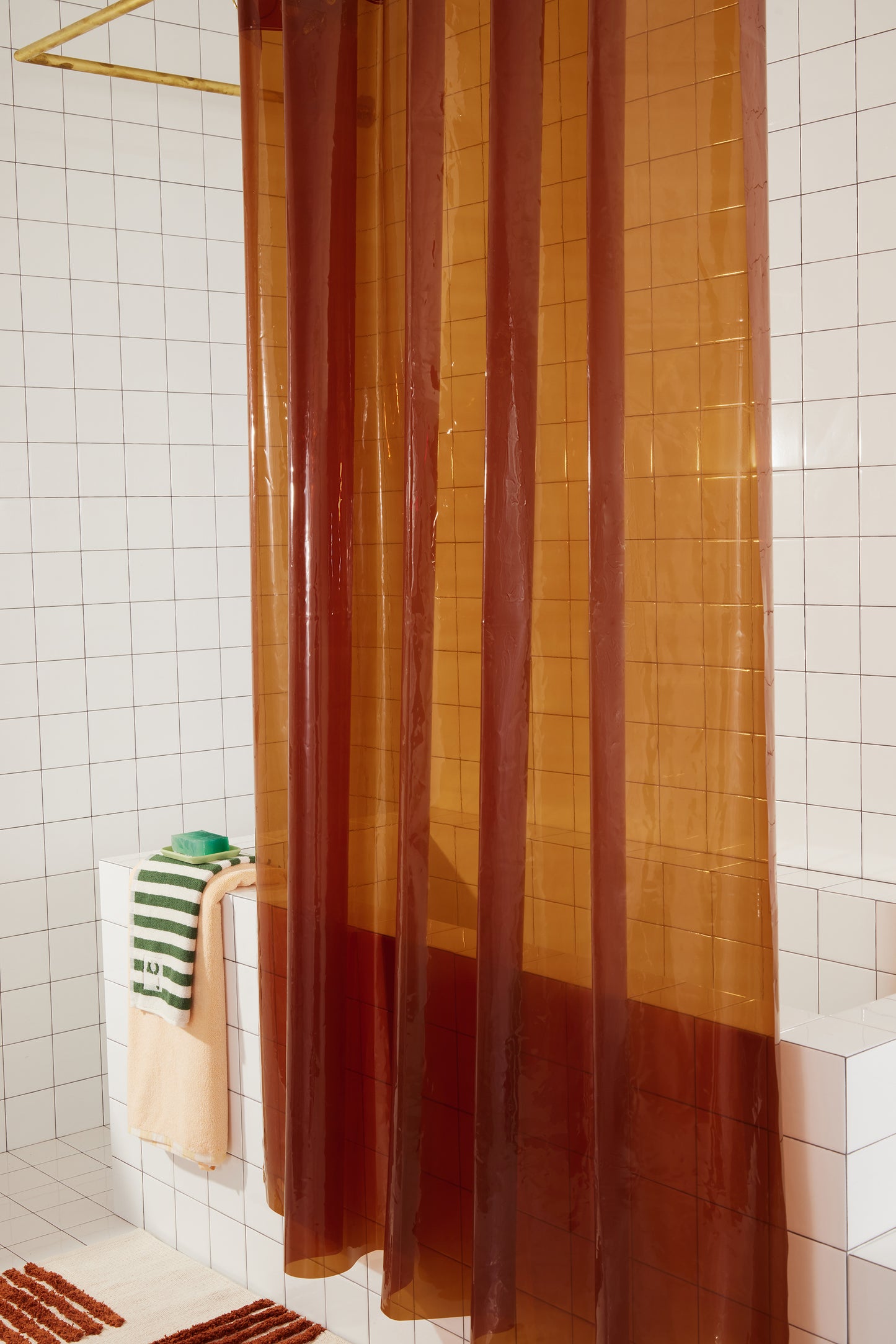 Sun Shower Honey side view of curtain hanging in a bathroom.