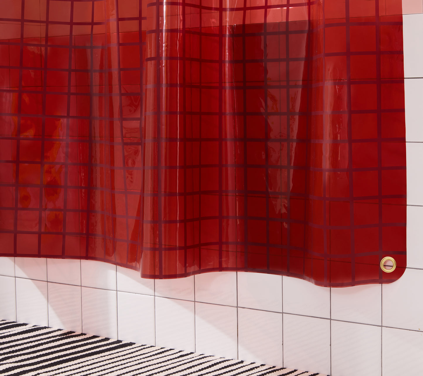 Close up detail of 2x2 sun shower curtain bottom hem.