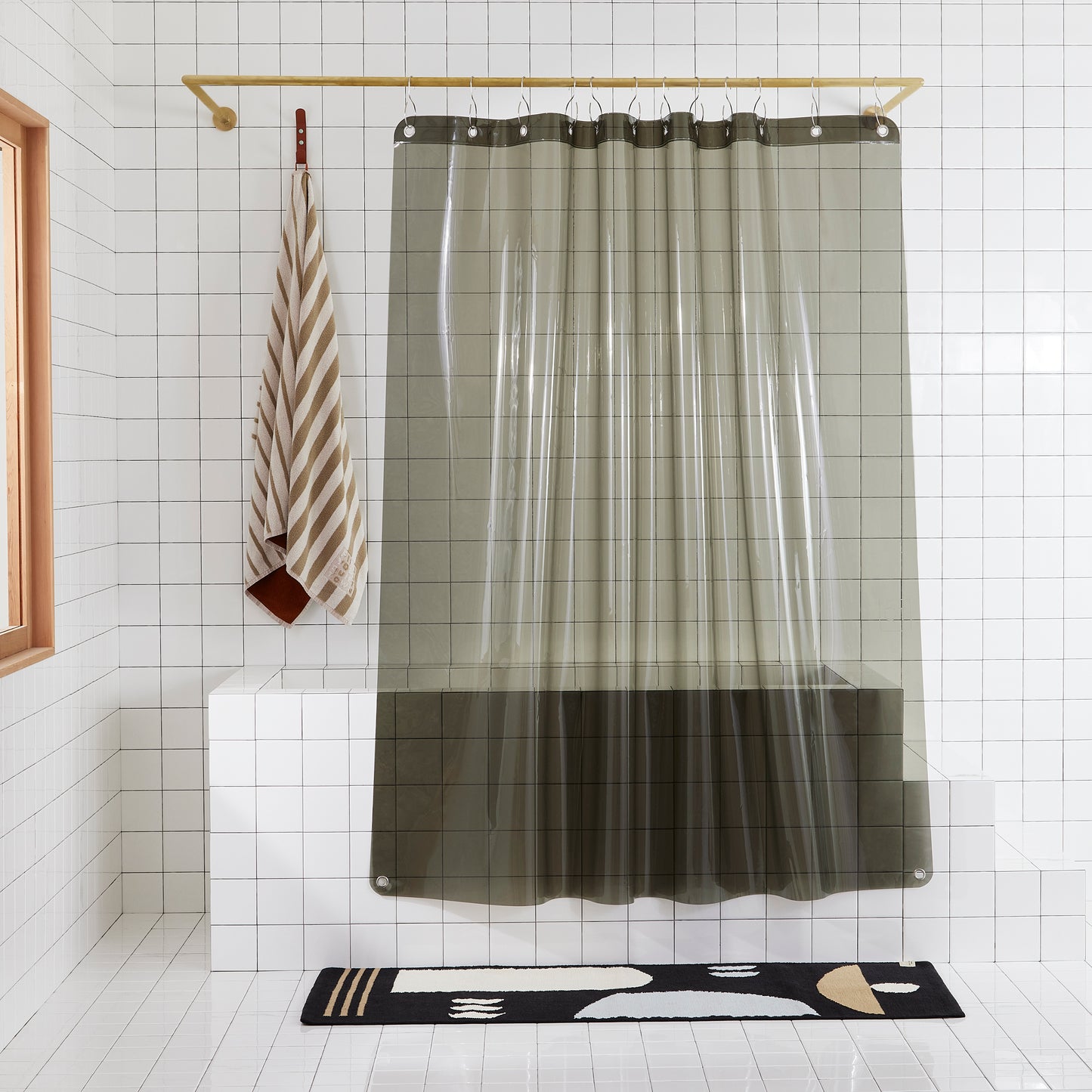 Sun Shower Night Ride front view of curtain hanging in a bathroom.