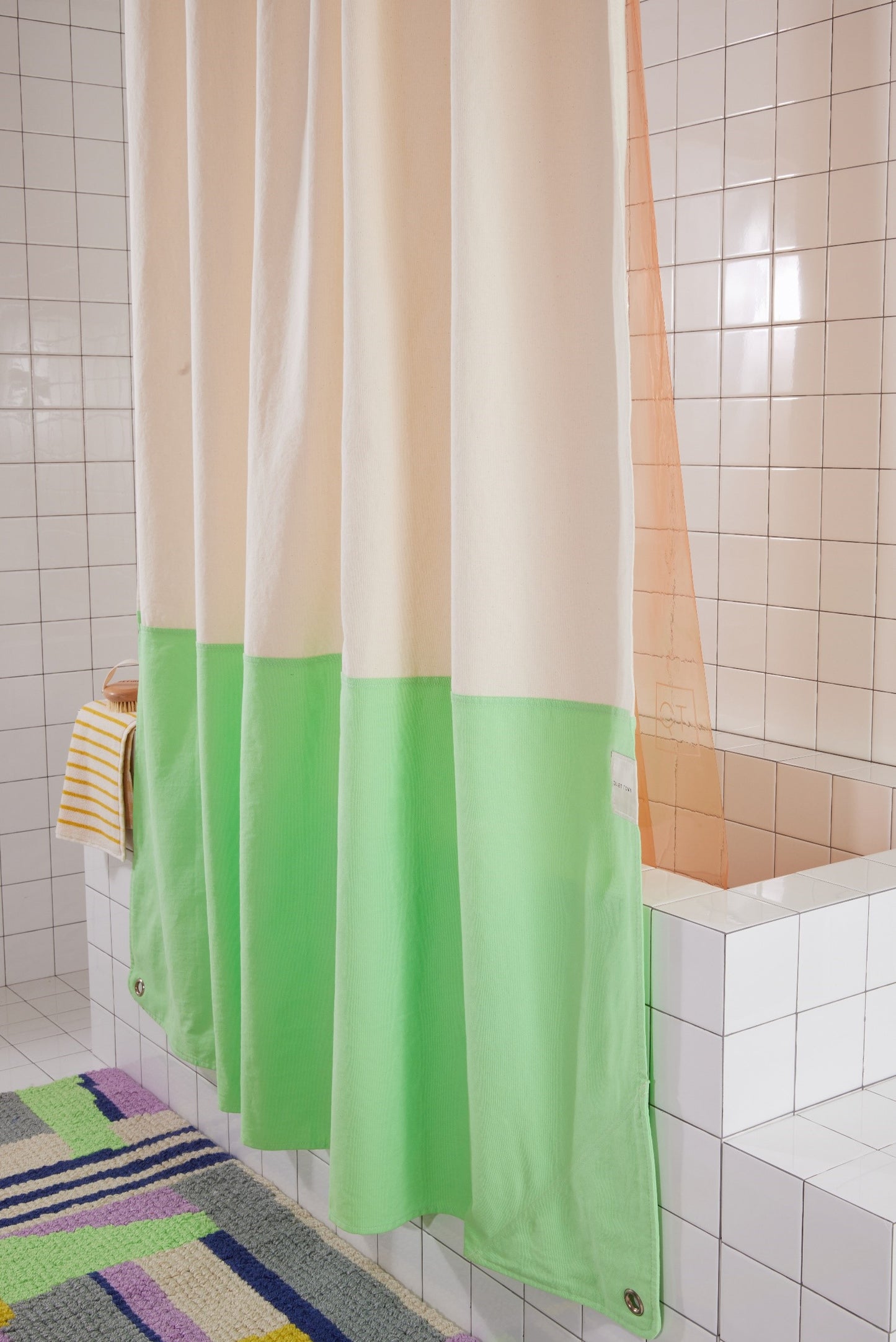 Orient Cucumber side view of curtain hanging in a bathroom.