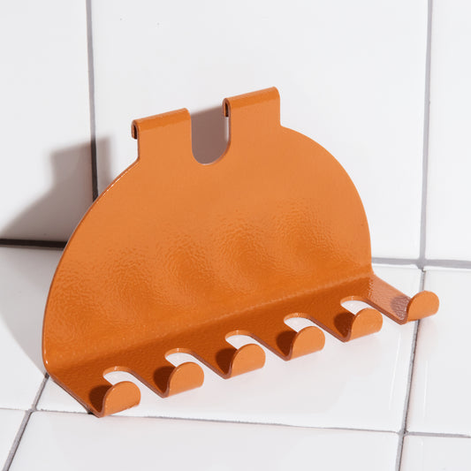 Aluminum toothbrush holder hook in clay.