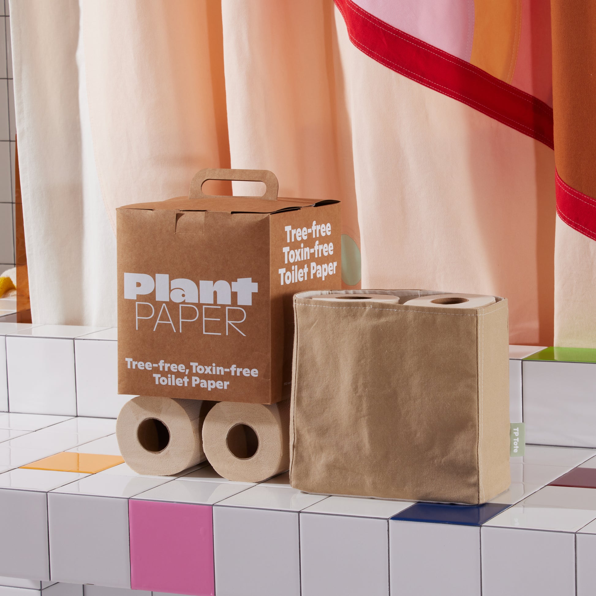 TP Tote in Desert packed with toilet paper in bathroom