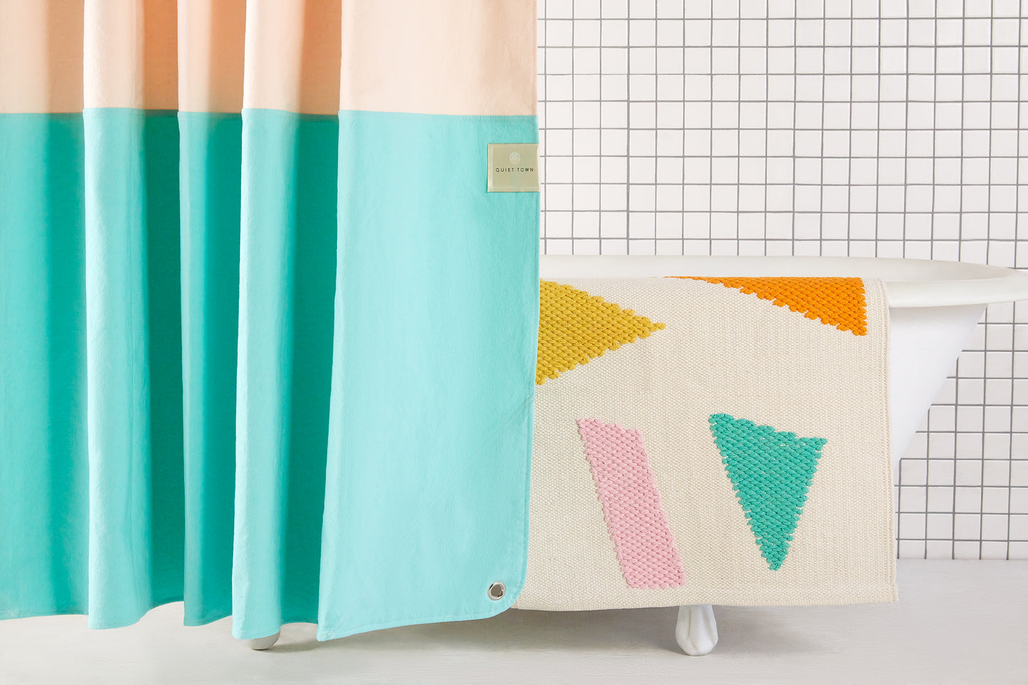 Ataco Canyon bath rug draped on edge of bath tub