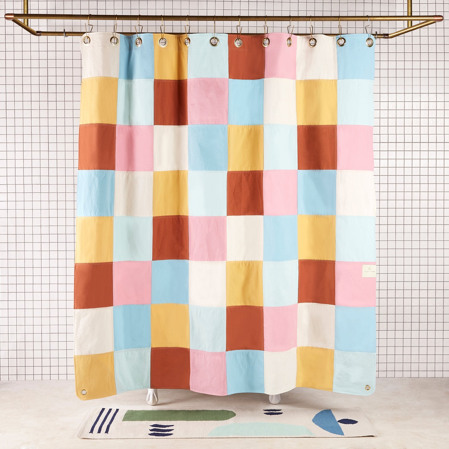 Re:Canvas Checker Deco front view of curtain hanging in a bathroom.