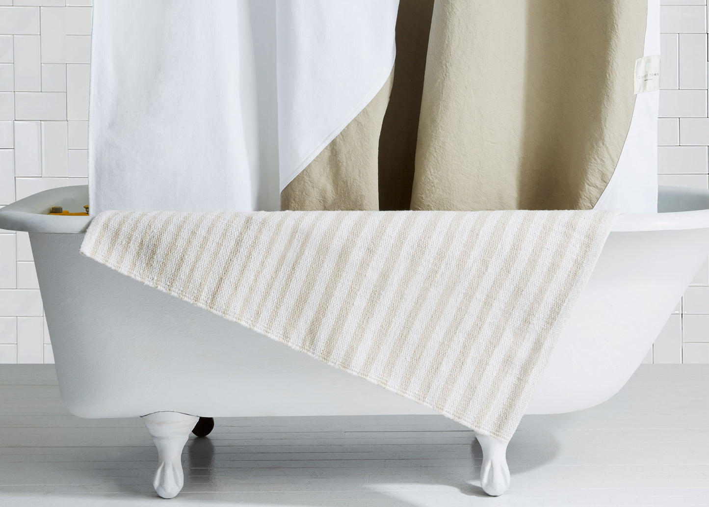 Ojai Sand draped on edge of bath tub