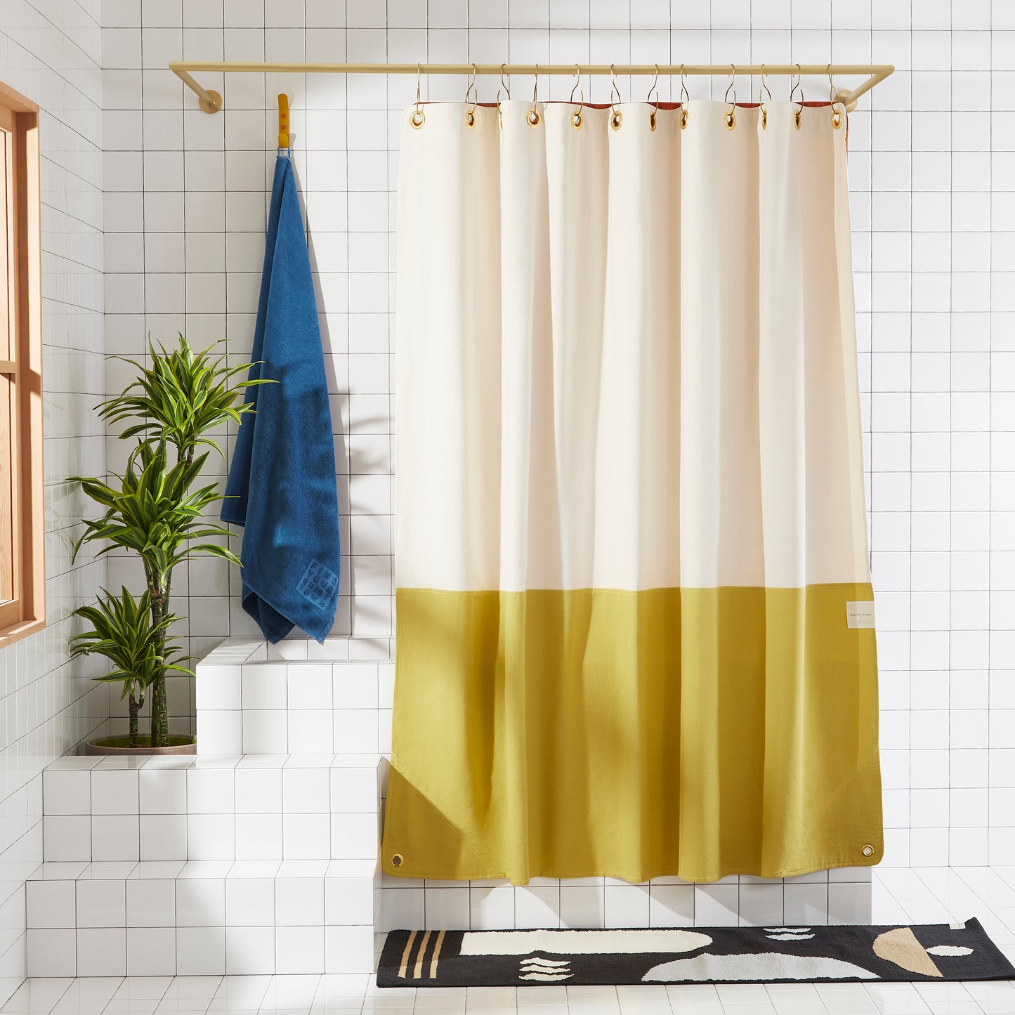 Orient Hesse front view of curtain hanging in a bathroom.