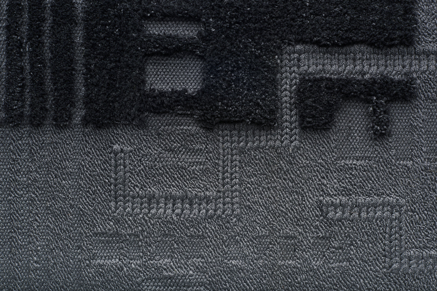 Dipsea Charcoal close up view of mat texture