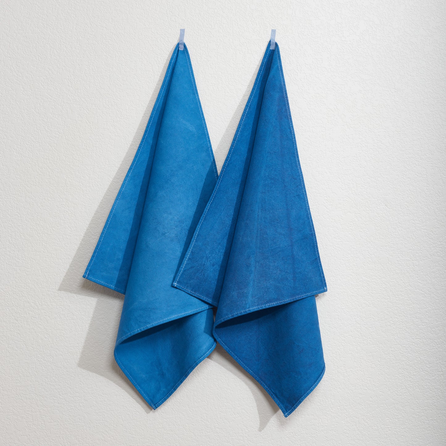 Naturally Dyed Napkins in Indigo hanging on wall