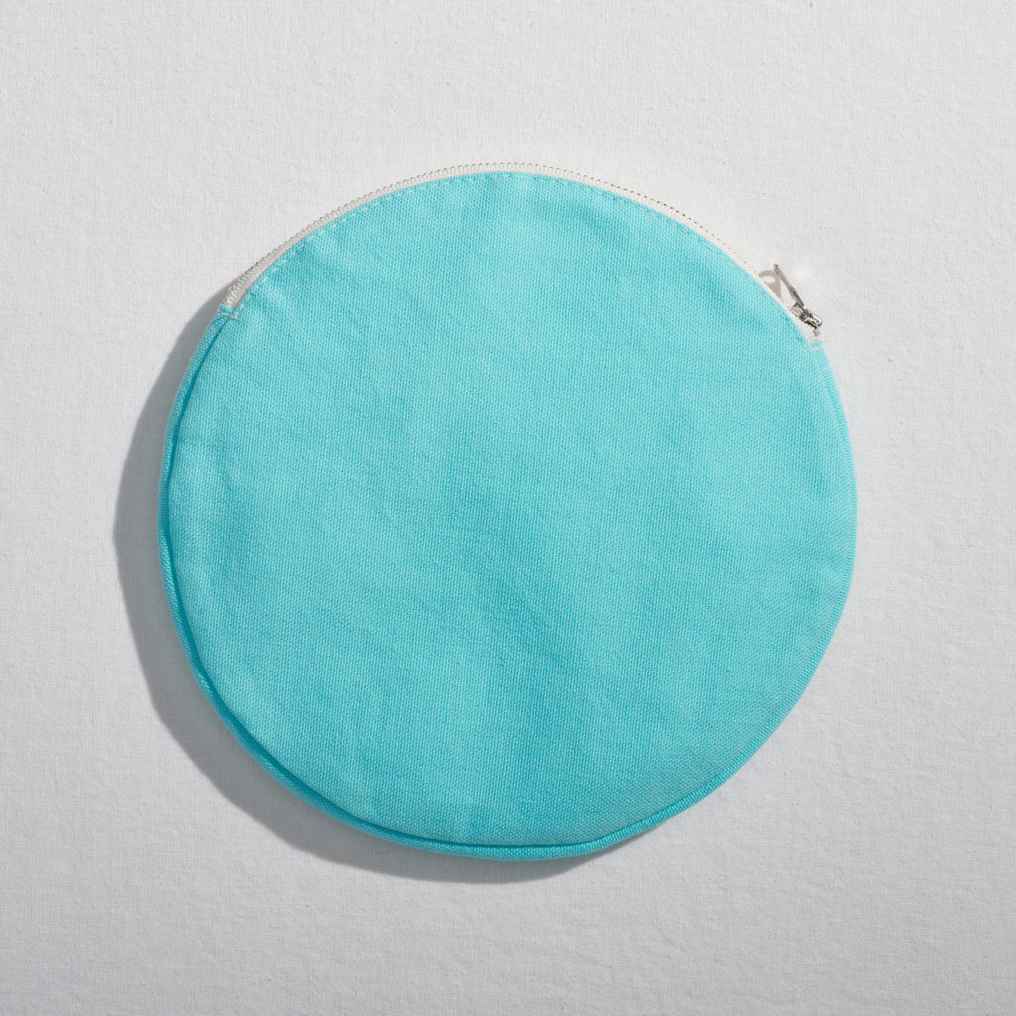 Re:Canvas "Threes" Pouch in Hesse front view of circle pouch
