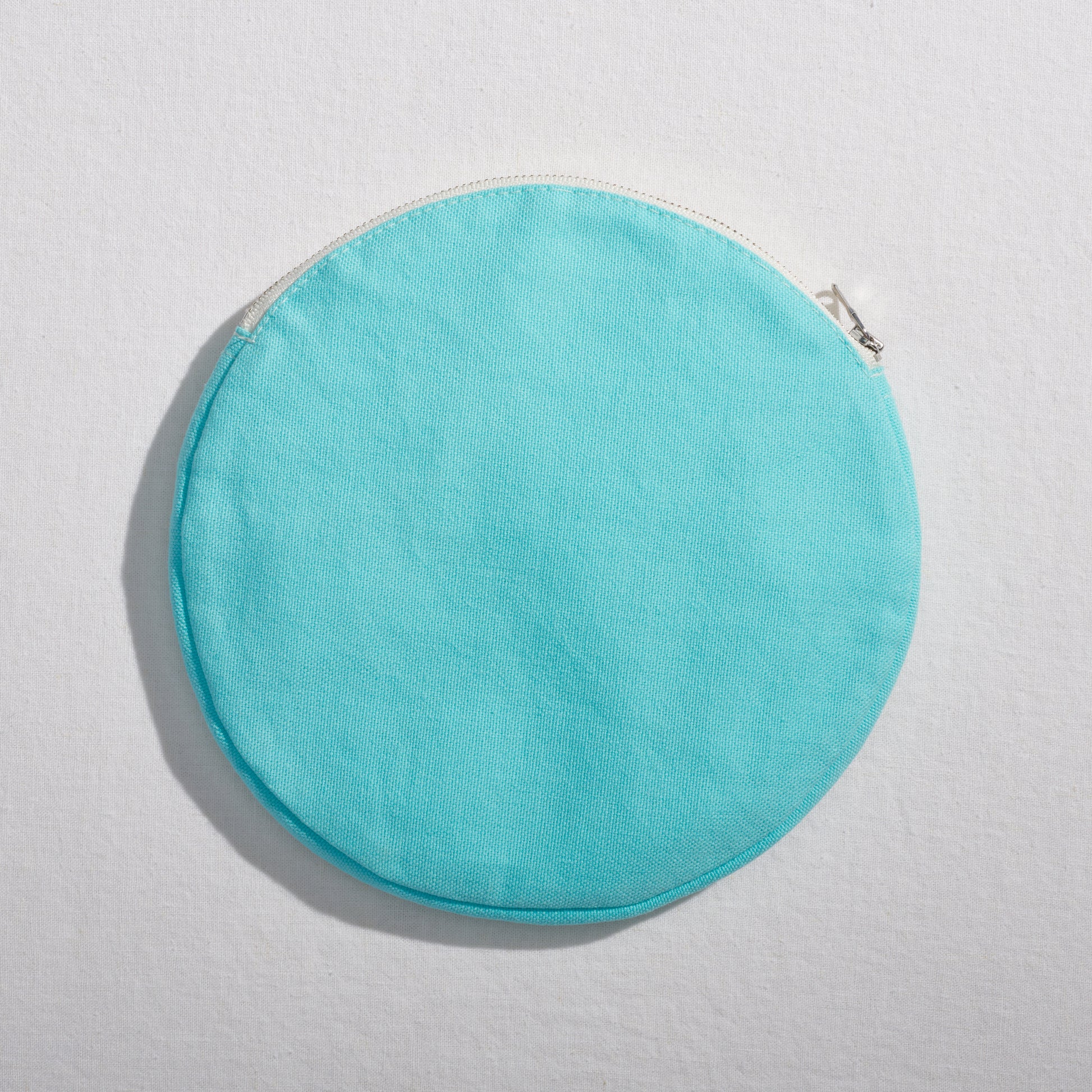 Re:Canvas "Threes" Pouch in Hesse front view of circle pouch
