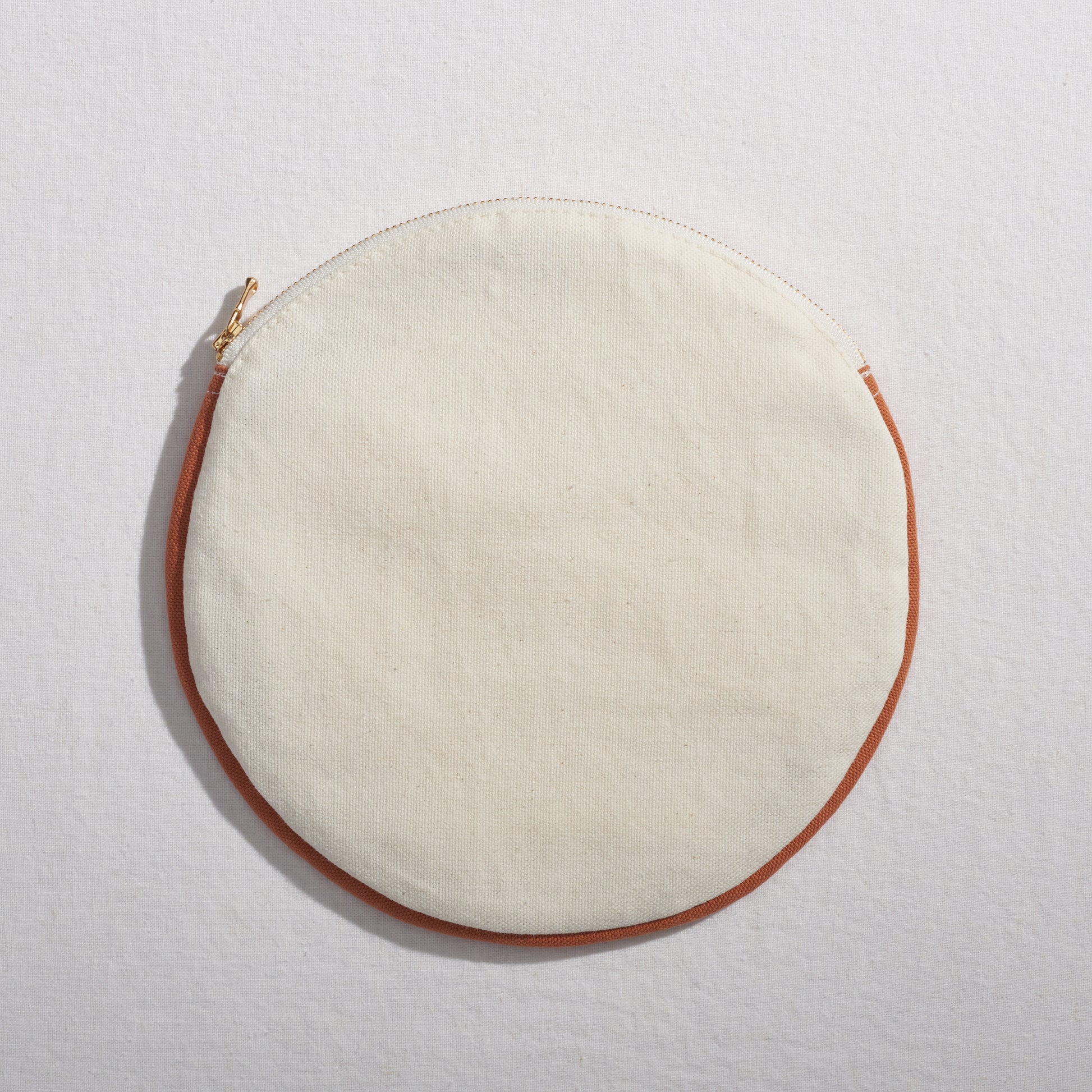 Re:Canvas "Threes" Pouch in Desert back view of circle pouch