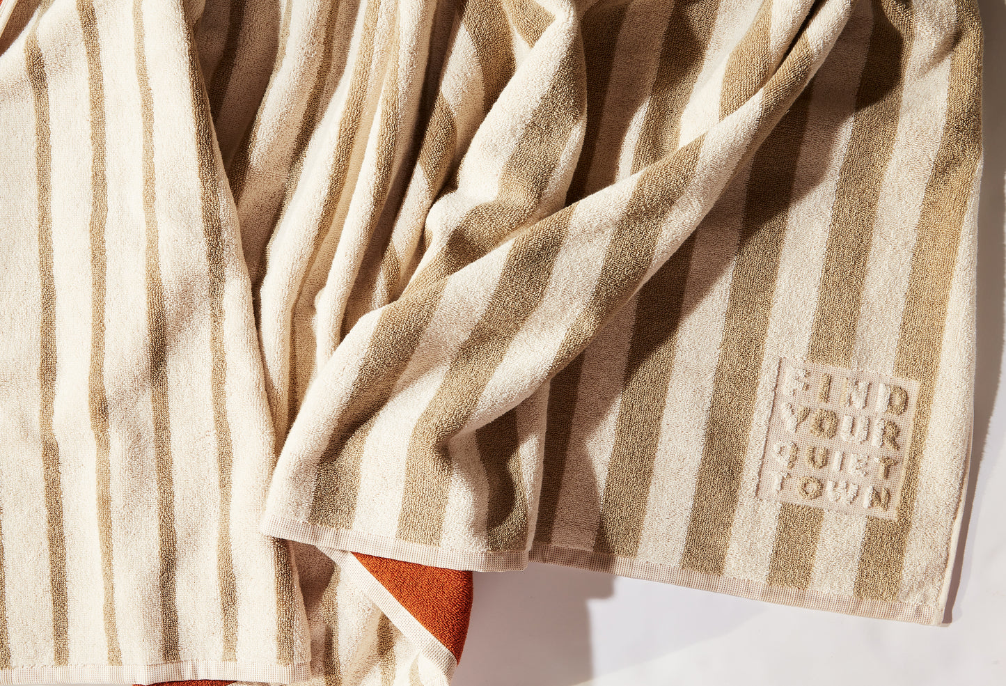 Ojai Towel Desert top shot crumpled on floor