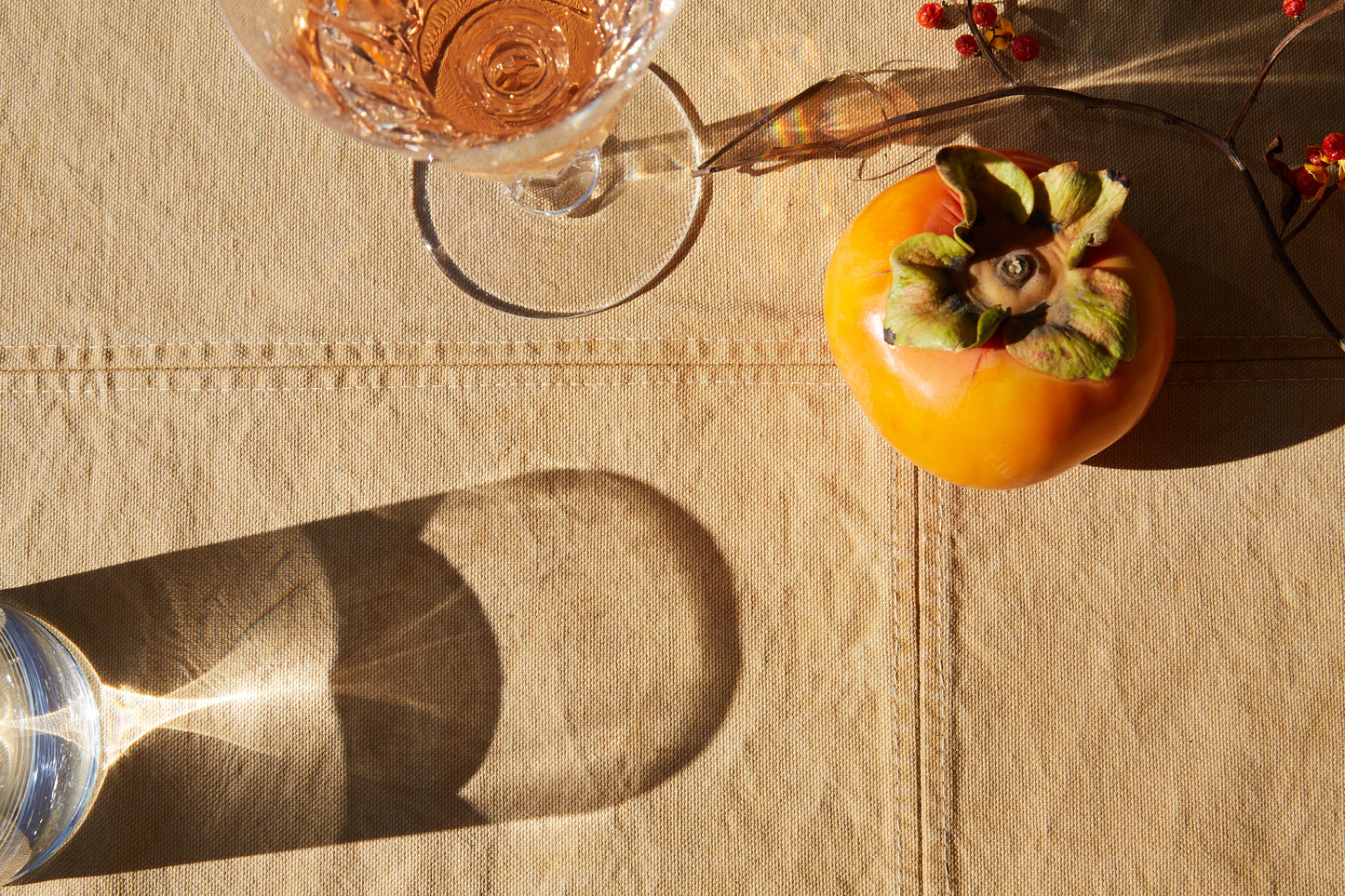 Naturally Dyed Tablecloth for 8 in Eucalyptus detail view with table arrangement