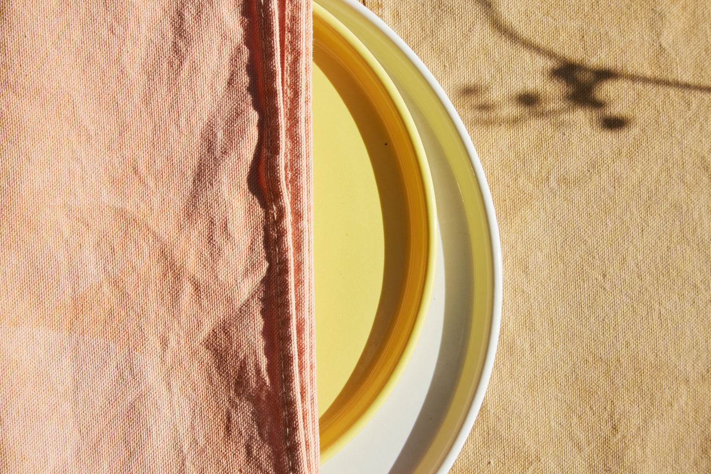 Naturally Dyed Tablecloth for 4 in Eucalyptus detail view with tableware