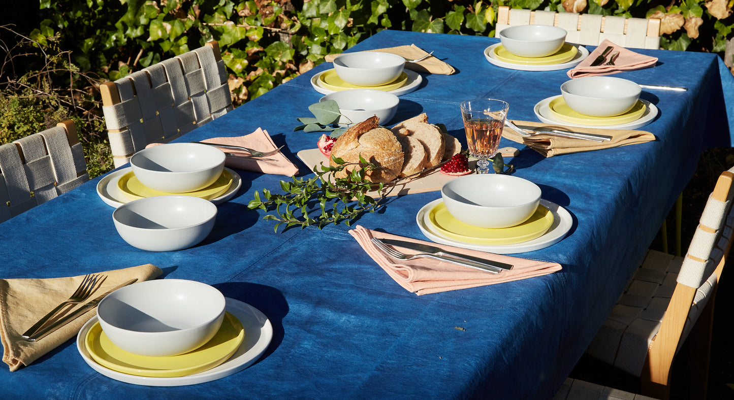 Naturally Dyed Tablecloth for 8 in Indigo detail view in outdoor dining