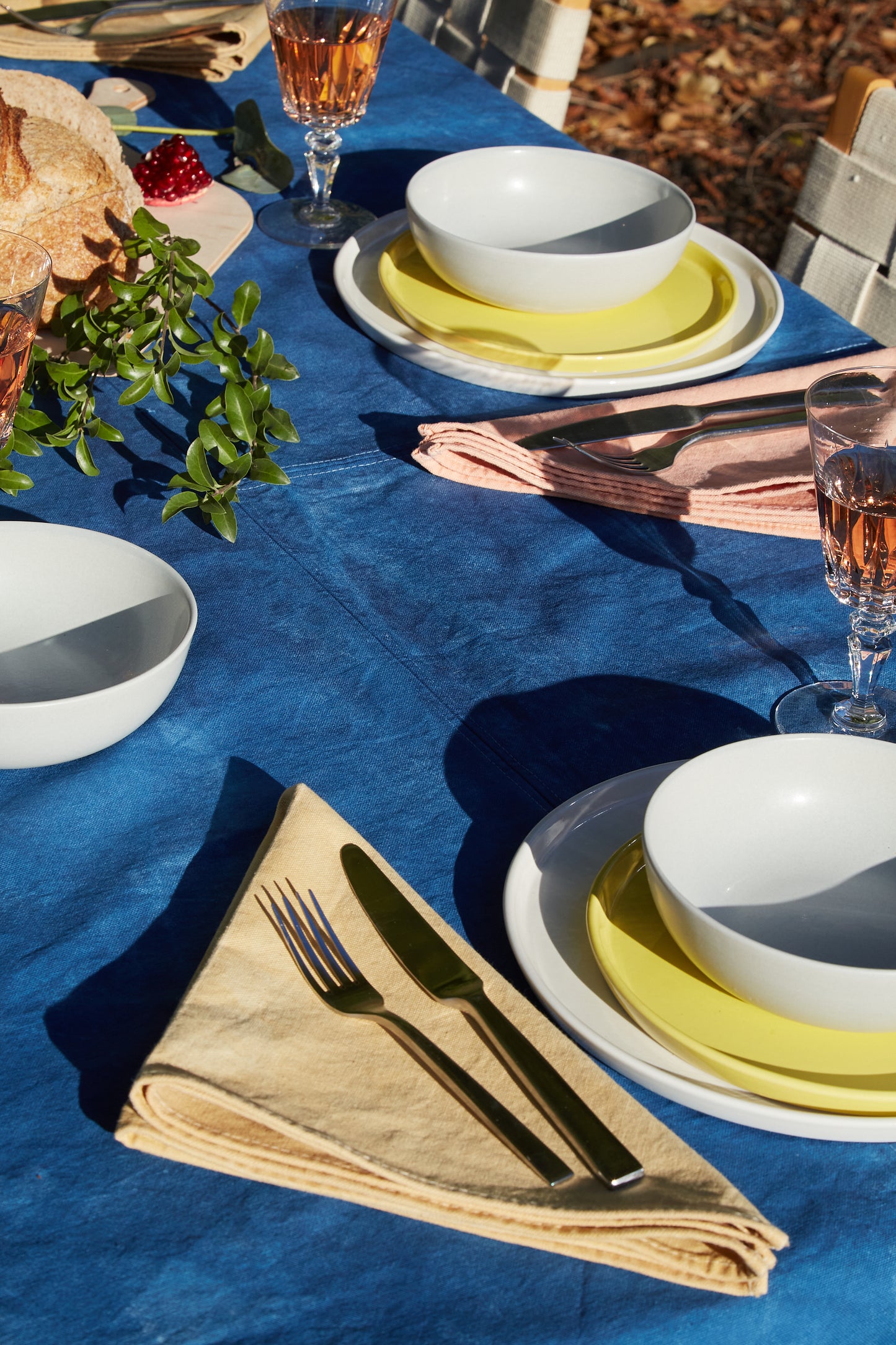 Naturally Dyed Napkins in Eucalyptus detail view with outdoor dining