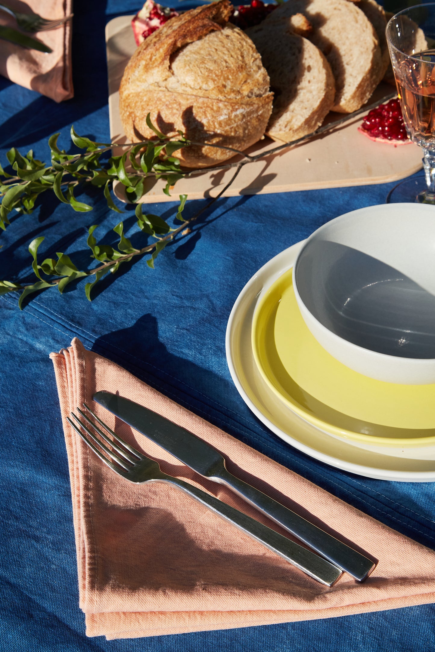 Naturally Dyed Tablecloth for 4 in Indigo detail view with table arrangement