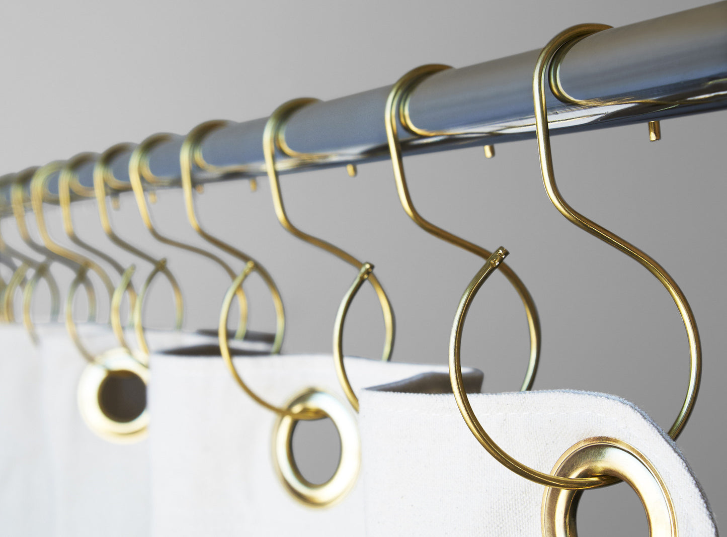 S-Hook Brass on curtain rod with shower curtain