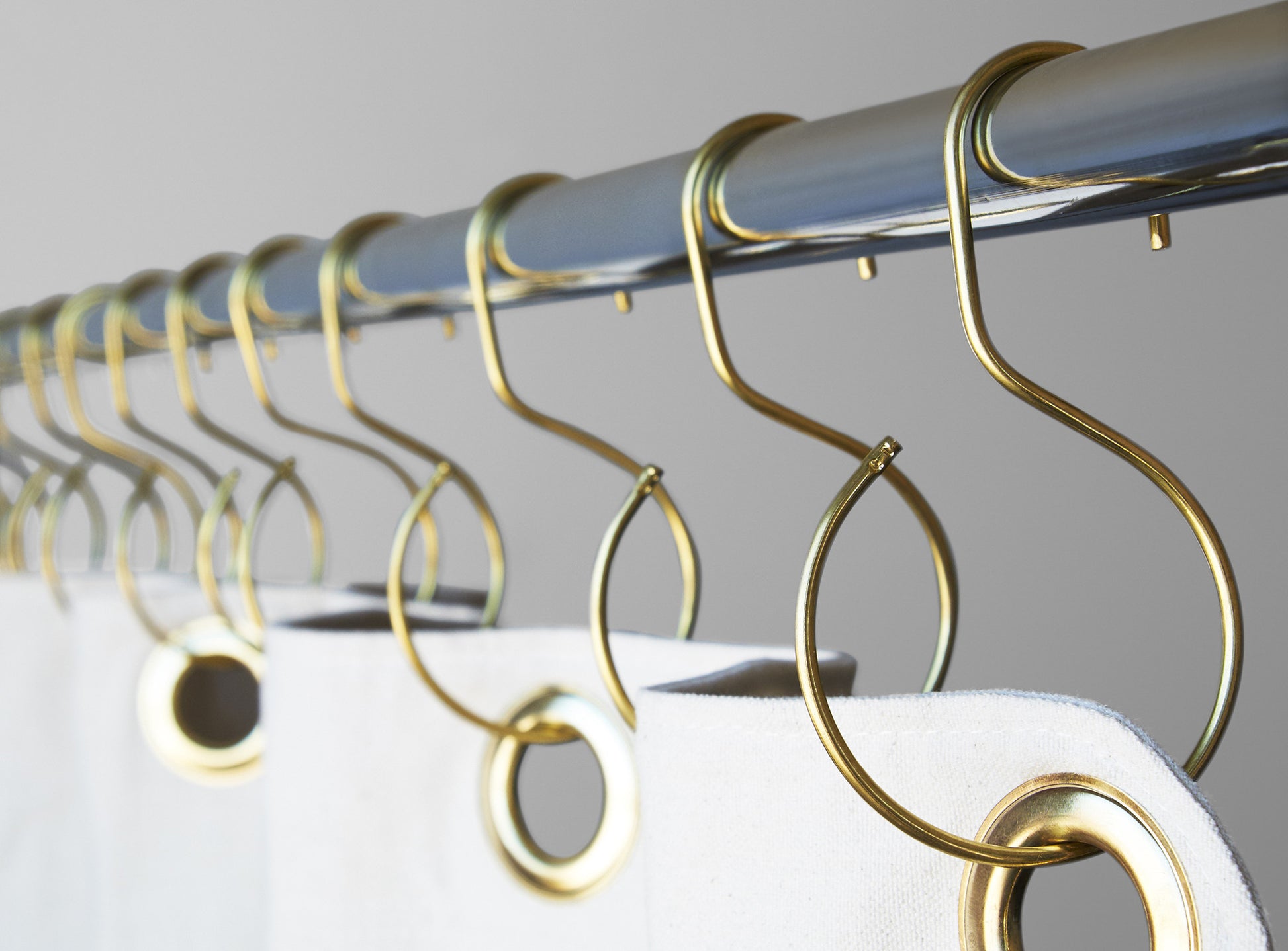 S-Hook Brass on curtain rod with shower curtain