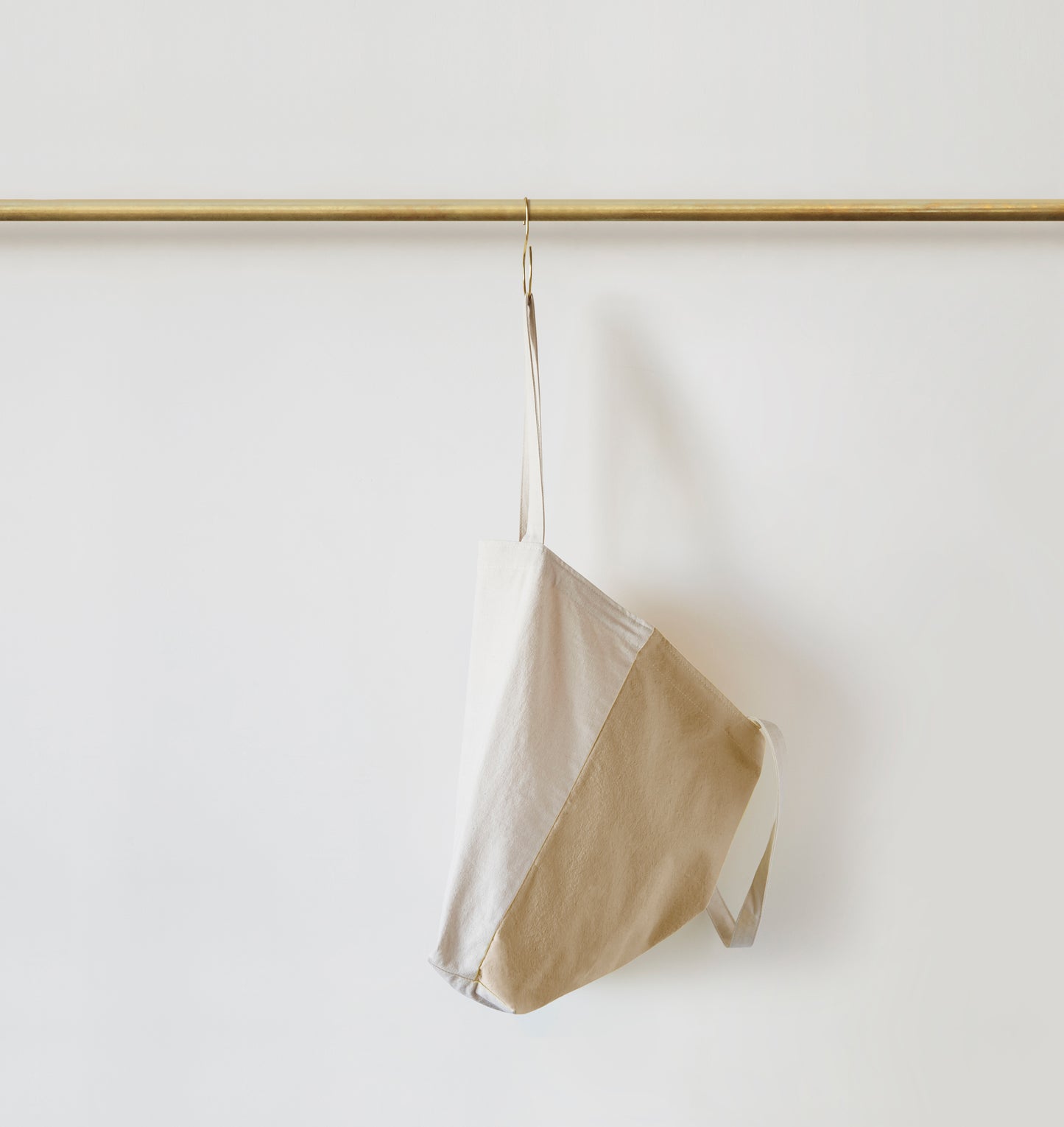 Re:Canvas Tote Hidden Beach side view hanging on rod