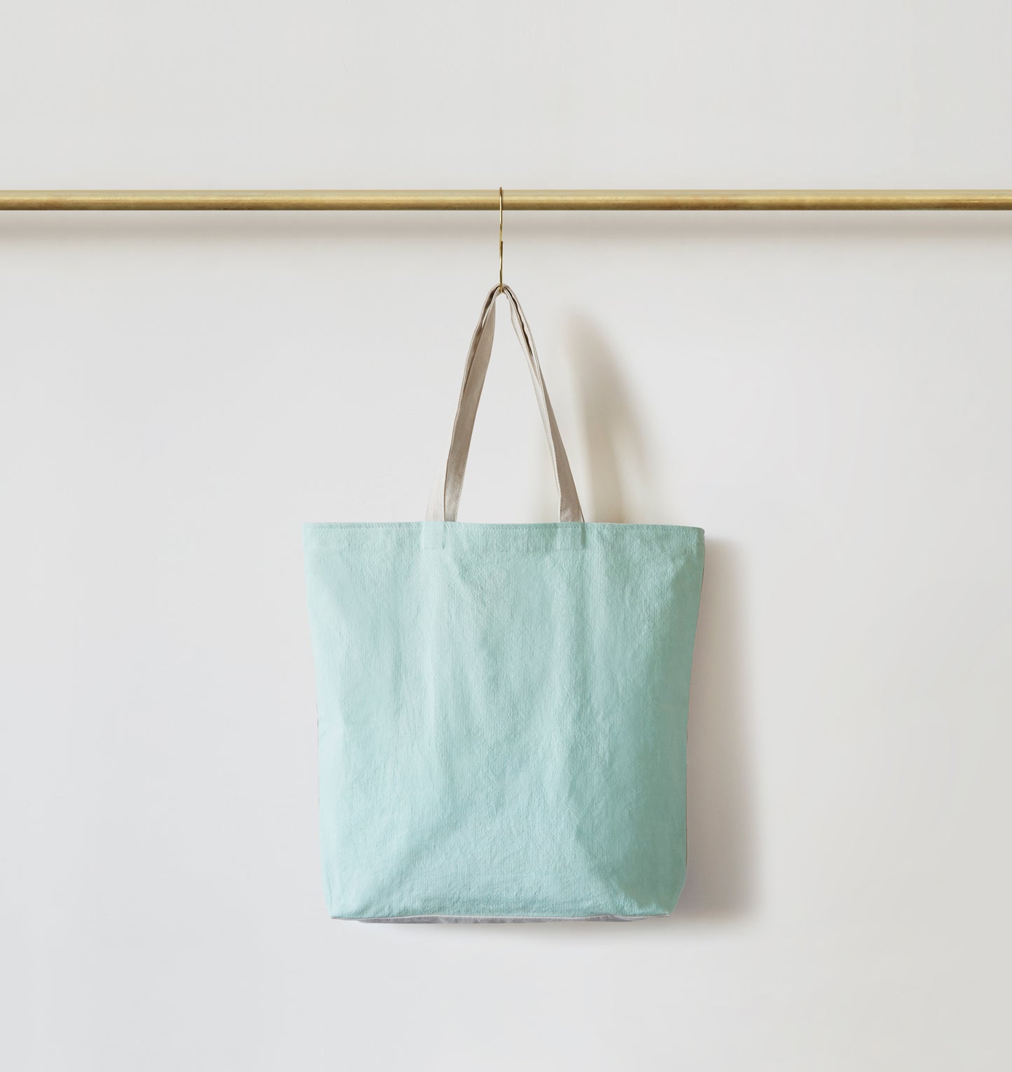 Re:Canvas Tote Mint front view hanging on rod