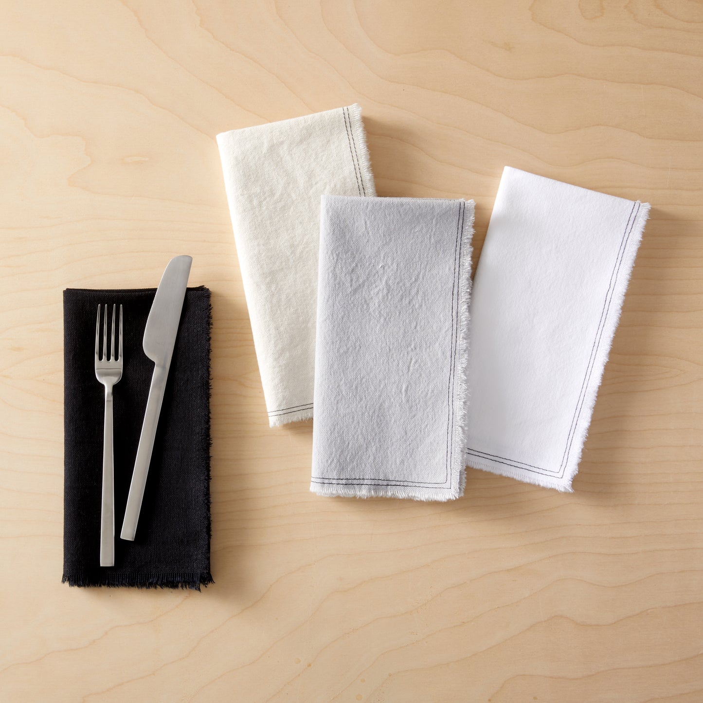 Napkins in Night Ride with tableware