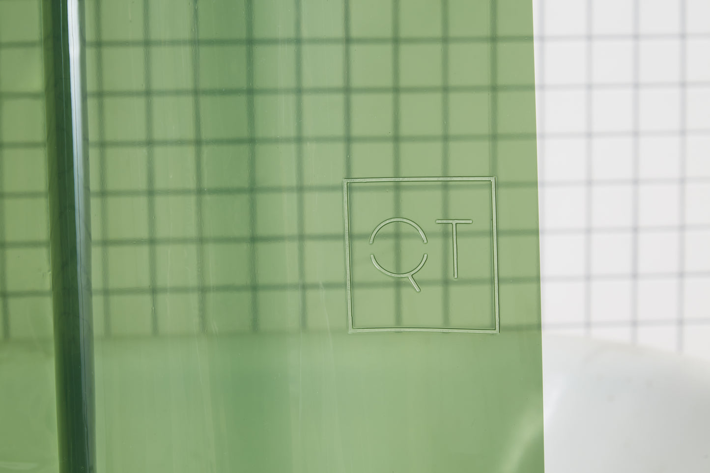 Sun Shower Pine detail view of Quiet Town Logo Embossed on curtain