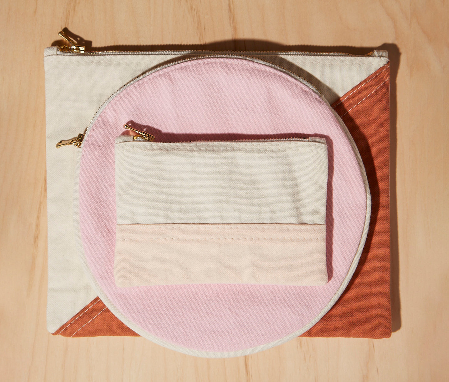 Re:Canvas "Threes" Pouch in Sunset stacked
