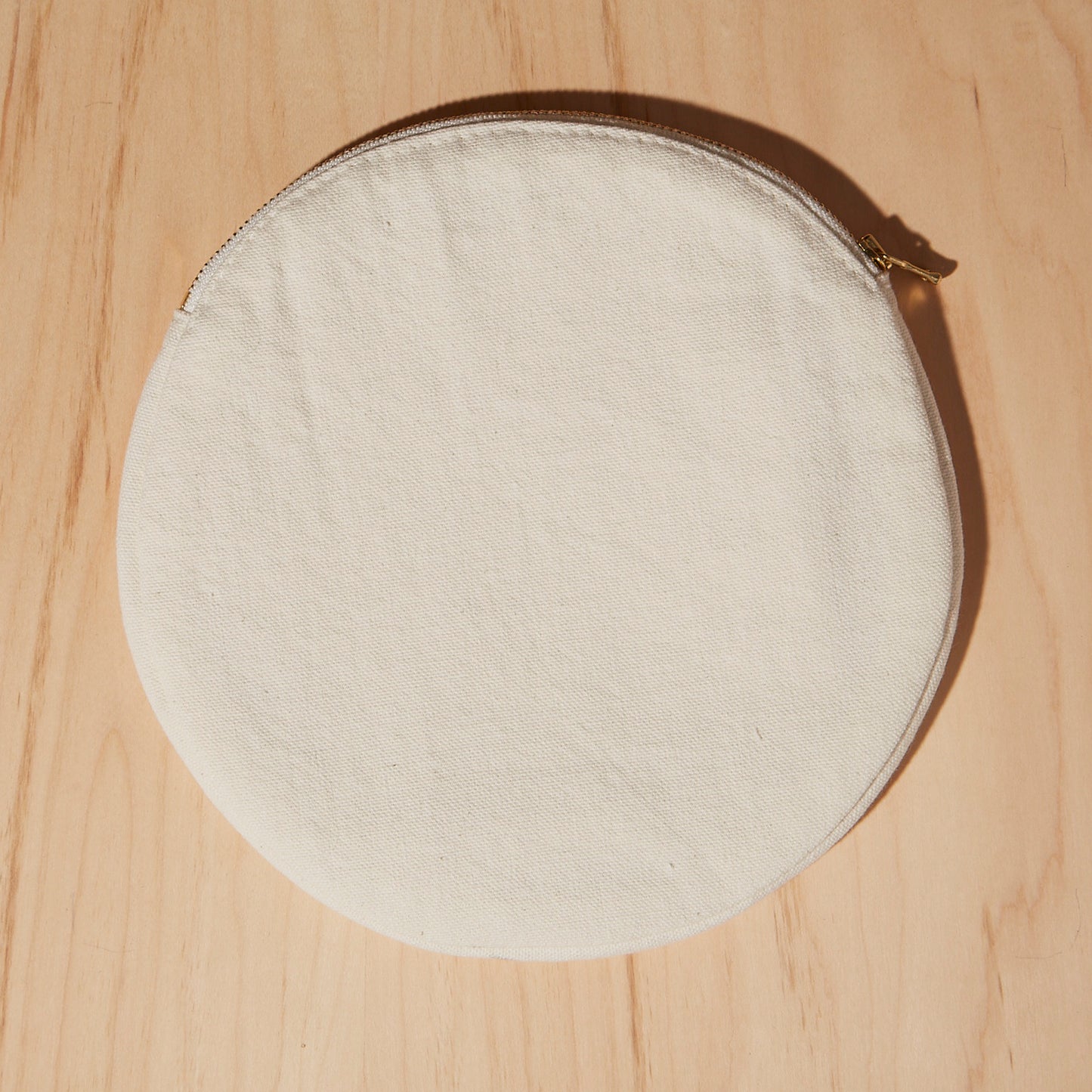 Re:Canvas "Threes" Pouch in Sunset back view of circle pouch