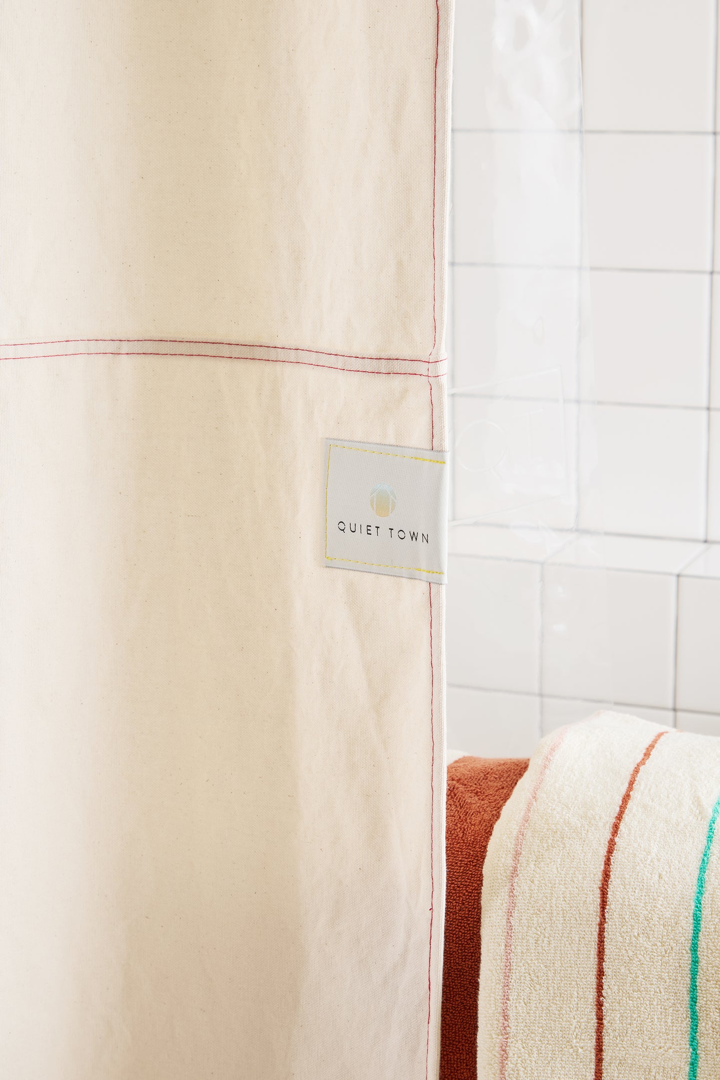 cream curtain with Quiet Town square label. 