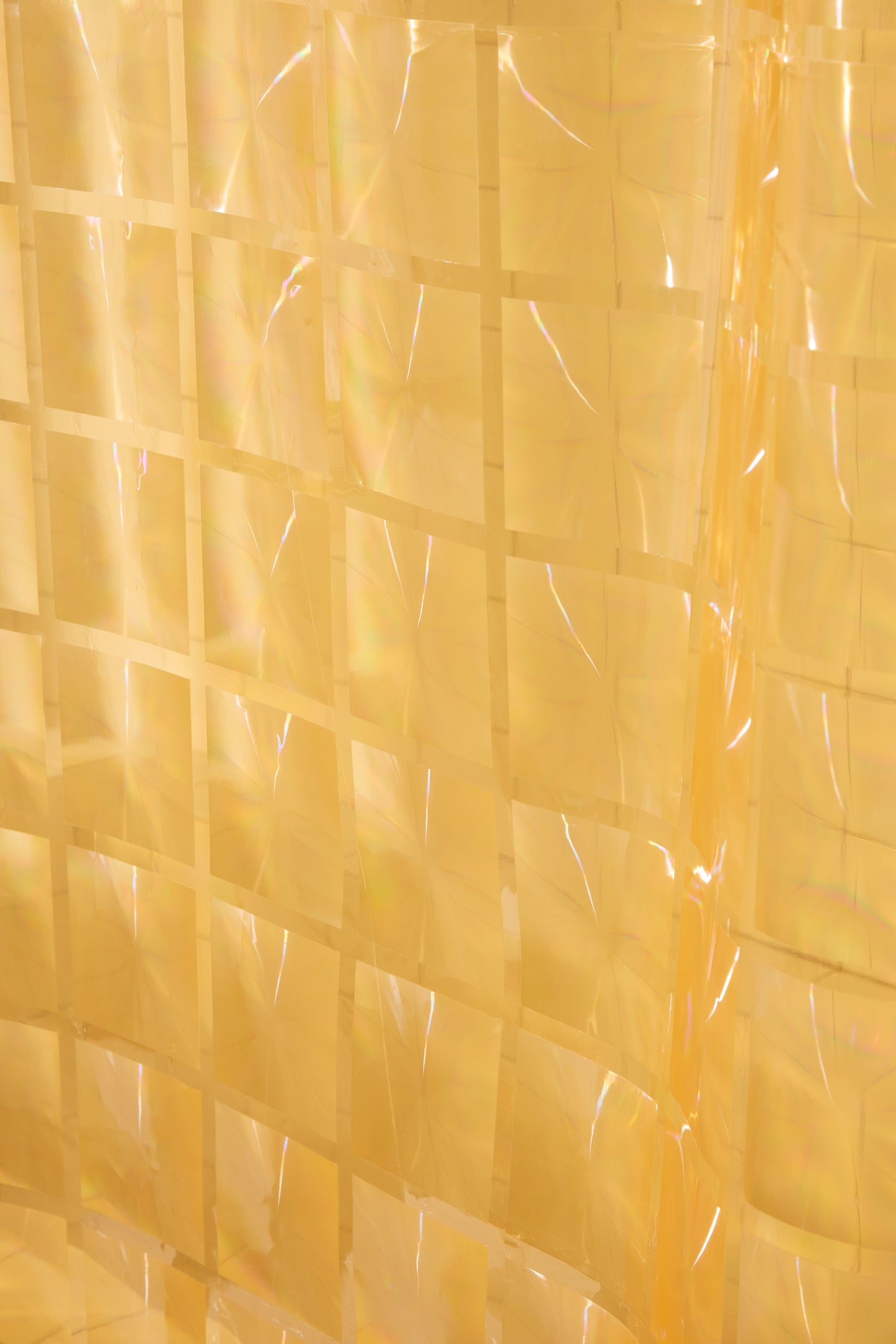 Close-up of a yellow shower curtain 