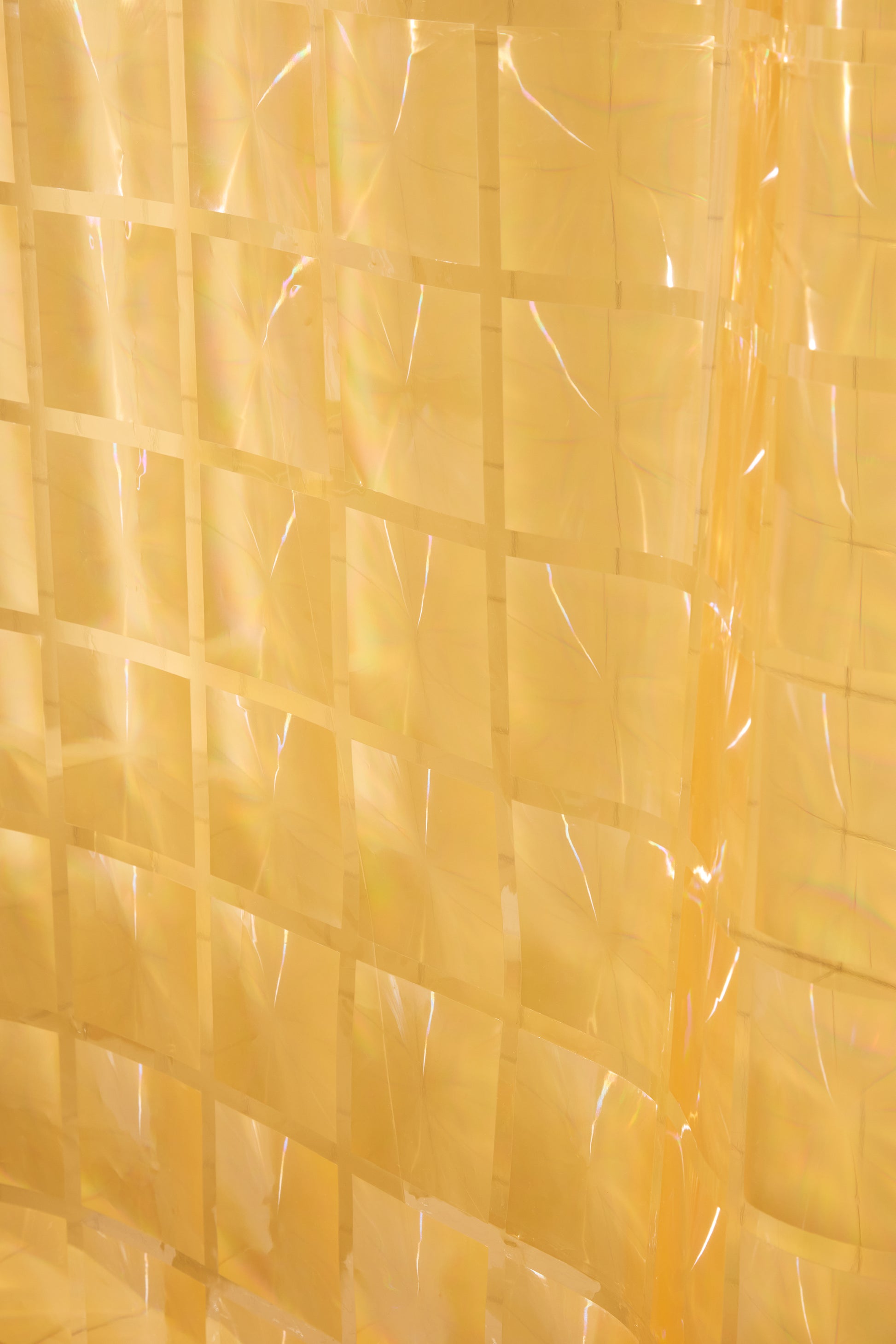 Close-up of a yellow shower curtain 