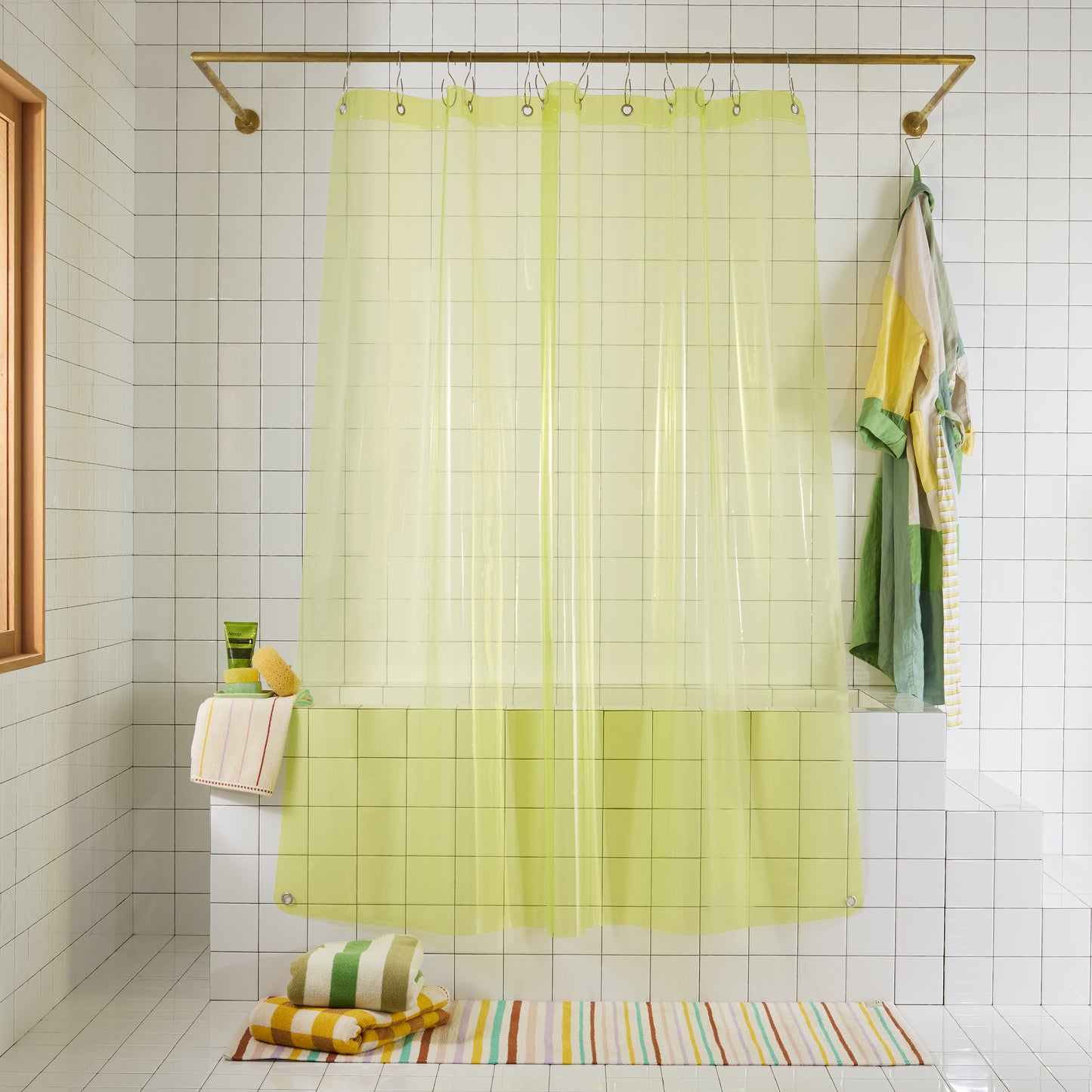 Yellow shower curtain in a bathroom setting