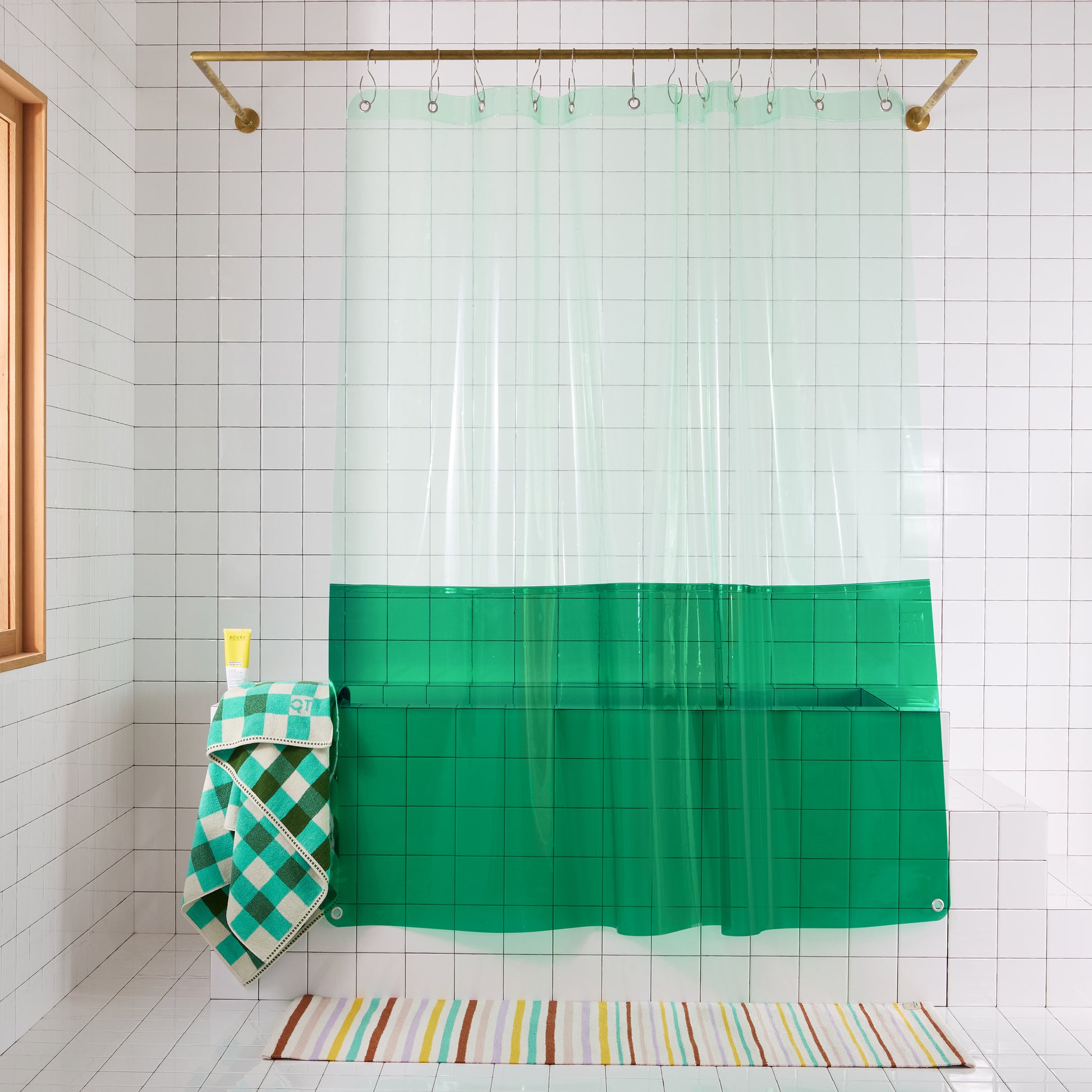 Green shower curtain in a bathroom setting
