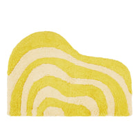 yellow wavy bath rug on white background