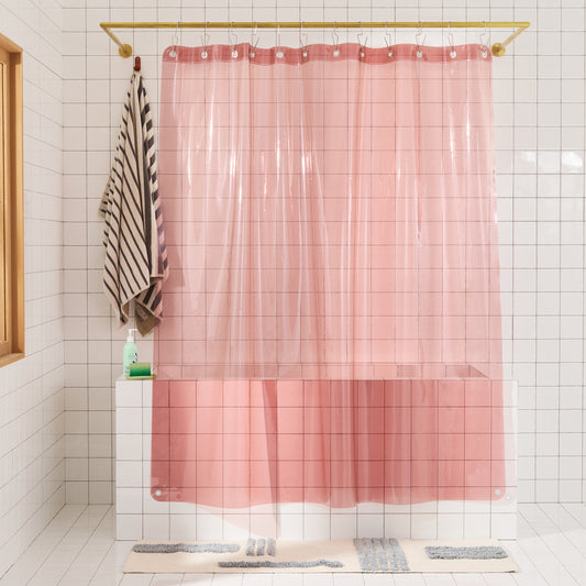 Sun Shower in Rose front view of curtain hanging in a bathroom.