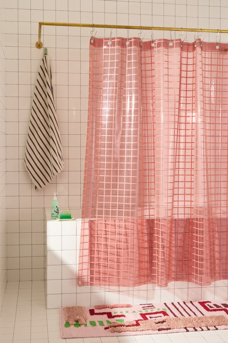 Sun Shower in Rose 2x2 side view of curtain hanging in a bathroom.