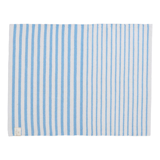 blue and cream striped mat on white background. 