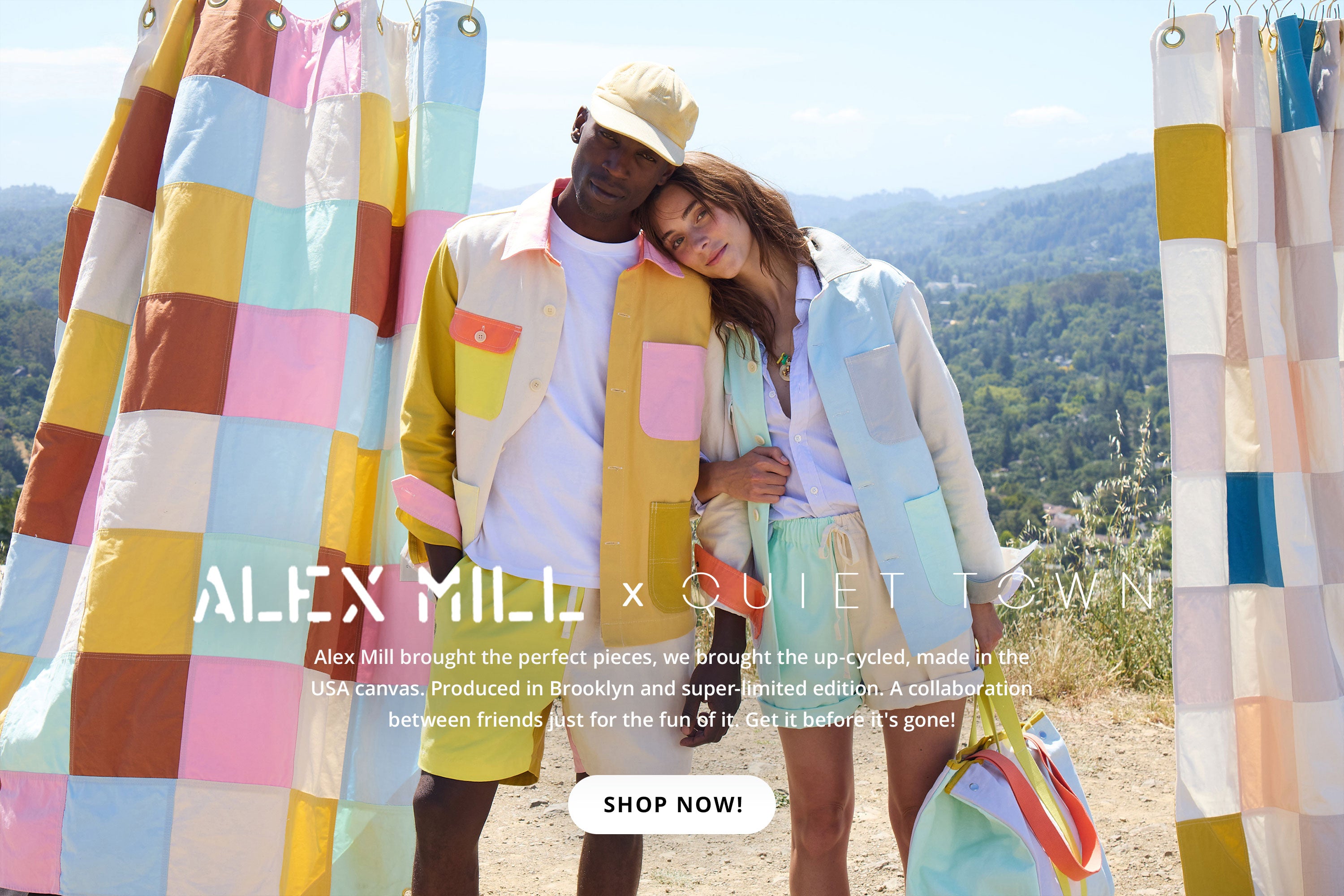 two people in colorblocked outfits on top of a hill. 