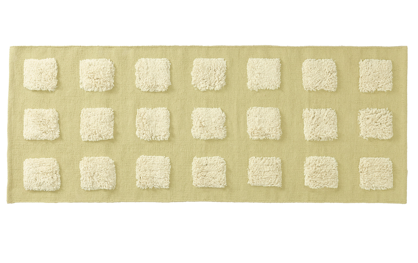 long rectangular limey green textured rug on a white backgrond. 