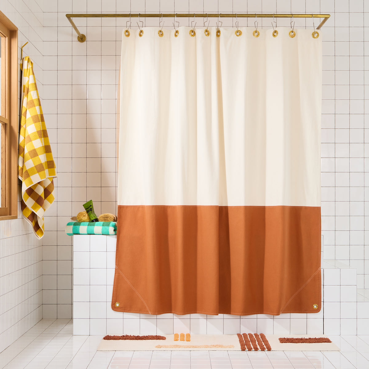 Orient Clay front view of curtain hanging in a bathroom.