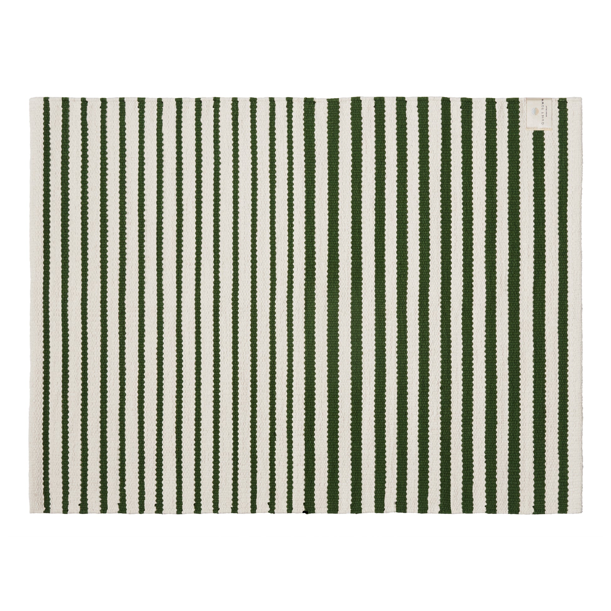 Striped green and white rug on a white background