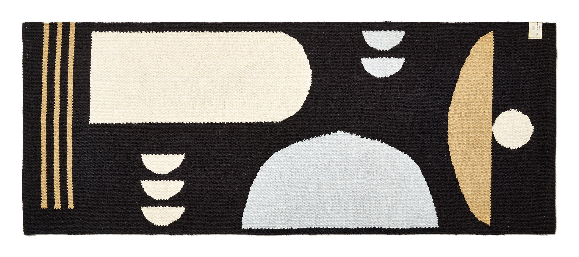 black and grey and cream colored runner bath rug