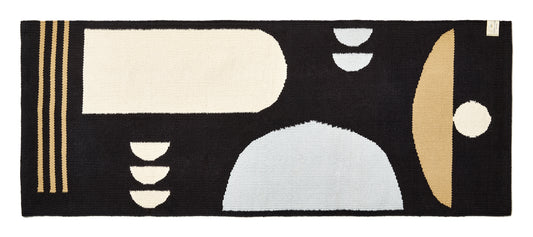 black and grey and cream colored runner bath rug