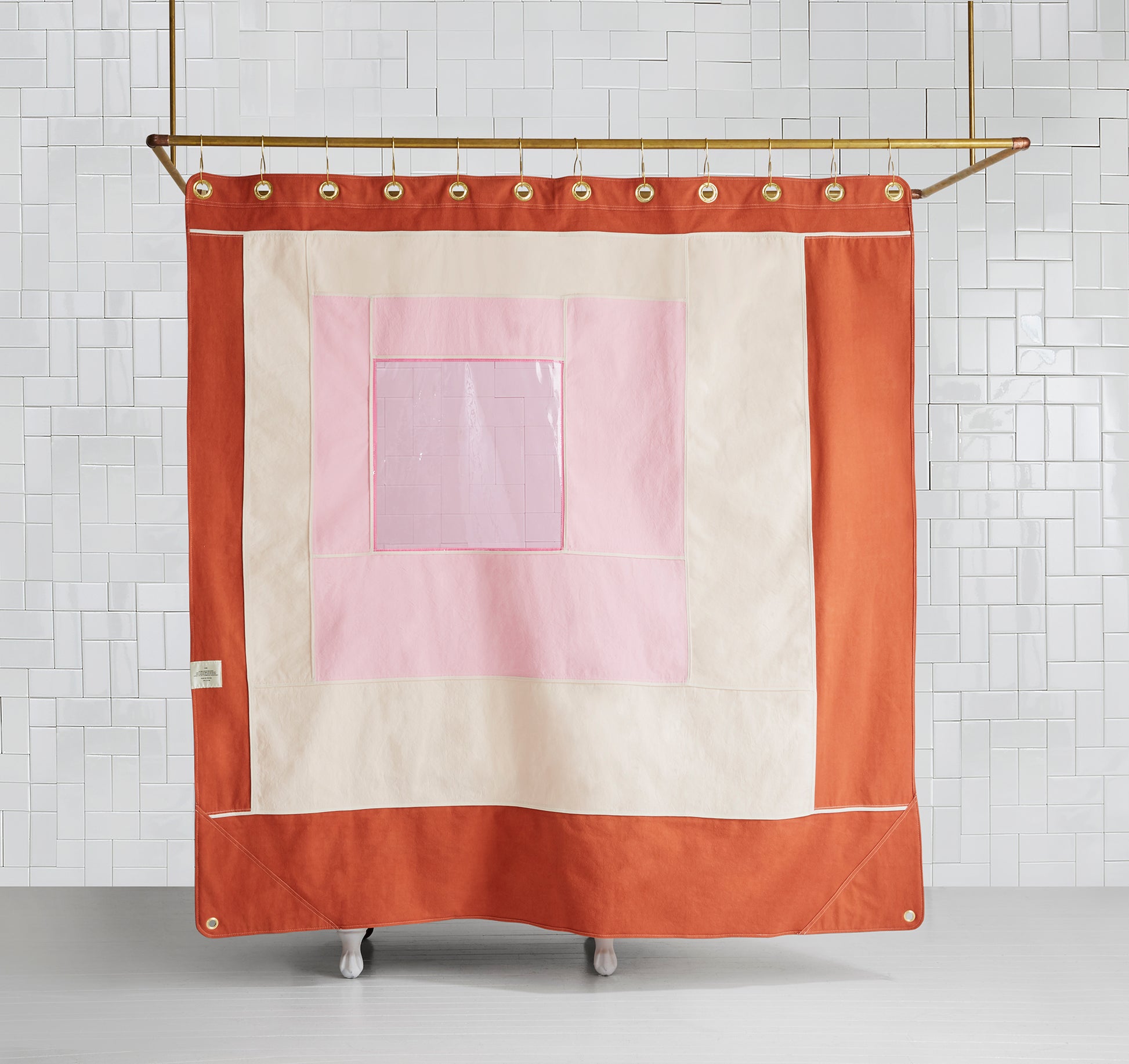photo of back of multi-color pink curtain with clear pink center. 