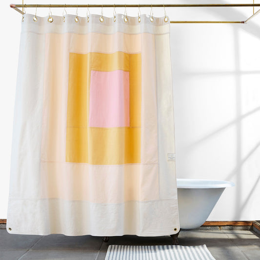 Marfa Cloud front view of curtain hanging in a bathroom.