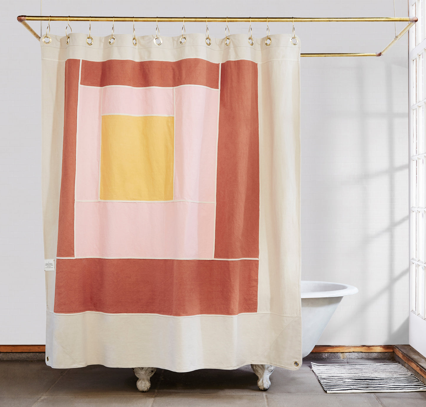 Marfa Clay front view of curtain hanging in a bathroom.